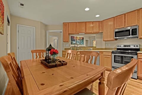 Relish your meals in our cozy dining area, perfect for shared moments and delightful conversations.