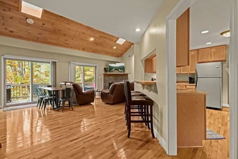 Step into unparalleled comfort in our living space – unwind on plush couches, enjoy the cozy fireplace, revel in smart TV entertainment, and step outside to your secluded paradise on the back deck.