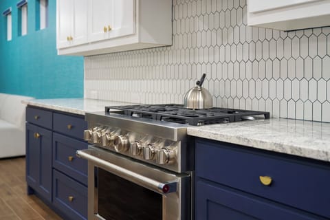 Gas range and prep space — full meals or quick bites.