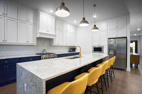 Large kitchen island — ideal for pregame meals and group snacks.