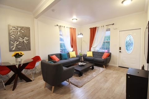 living room; happy and colorfulAll windows have blinds and curtains  