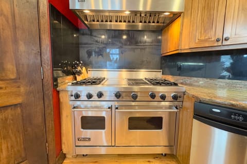 Little touches, like the artistic backsplash, make this home one-of-a-kind.