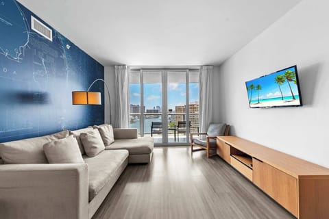 From the living room, step onto the connecting balcony to enjoy waterfront panoramas and beautiful sunsets.