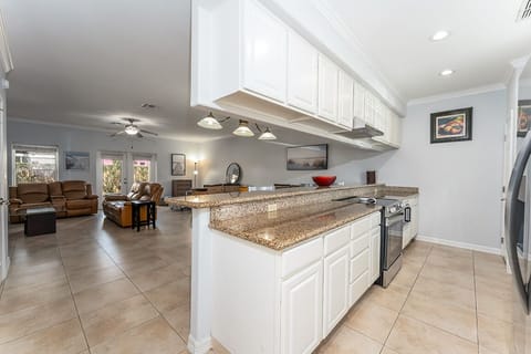 The kitchen has everything you need to whip up your family favorite eats! The breakfast bar is a bonus!