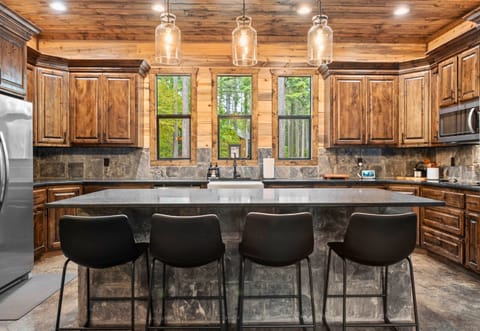 The kitchen’s bar seating is perfect for casual dining or keeping the chef company while they cook.