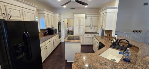 Fully stocked kitchen with two refrigerators