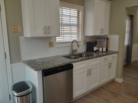 Kitchen with Gas stove , refrigerator, dishwasher and coffee bar
