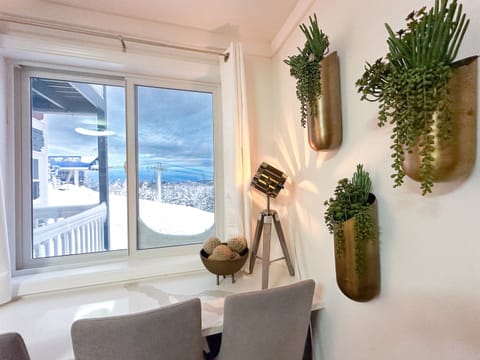 The main lift to the Village is just outside the decks and makes people-watching fun and easy.