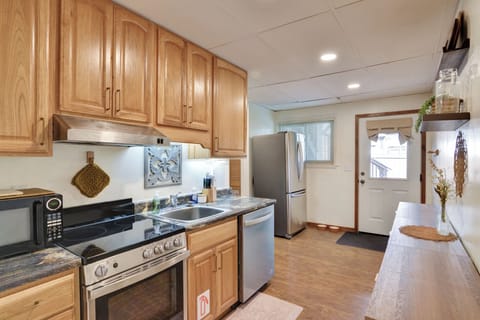 Fully equipped kitchen with small appliances including: blender, toaster, etc.