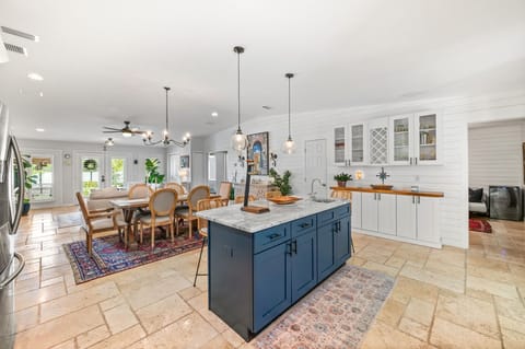 The dining area is bright and welcoming, with room for family and friends to gather.