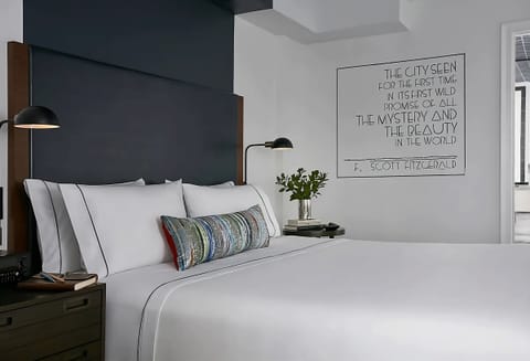 Recharge beside soft lighting and hotel-fresh pillows.