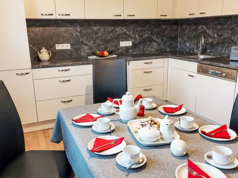Table, Cabinetry, Property, Furniture, Tableware, Dishware, Countertop, Drinkware, Cup, Saucer