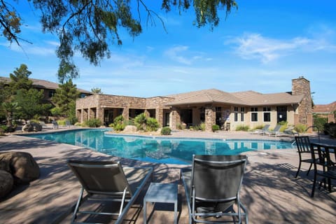 Lounge around the Coral Springs communal pool!