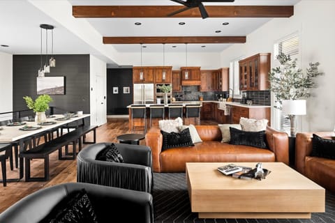 Experience effortless elegance in this luxurious open floor concept, seamlessly connecting the living, kitchen, and dining areas for the ultimate in modern living.