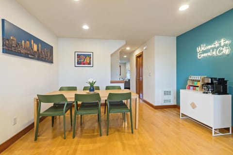 Enjoy meals at our spacious table in a warm, inviting setting.