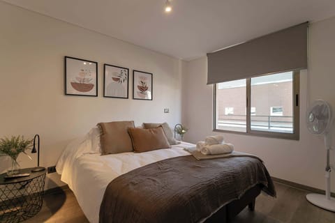 Dormitorio en suite con cama queen, ideal para descansar