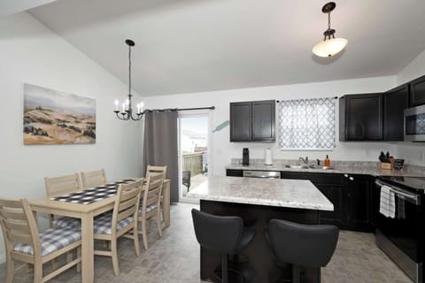 Enjoy mealtime memories together in the chic kitchen & dining room
