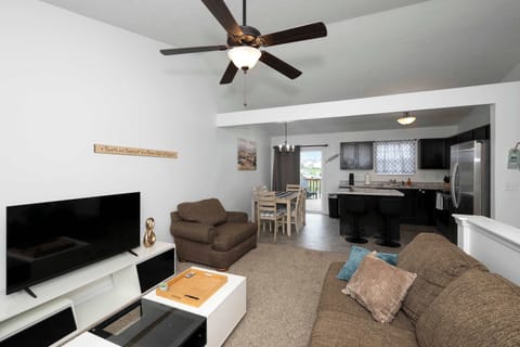 Lounge in the comfy living room & stream your favorites on the smart TV