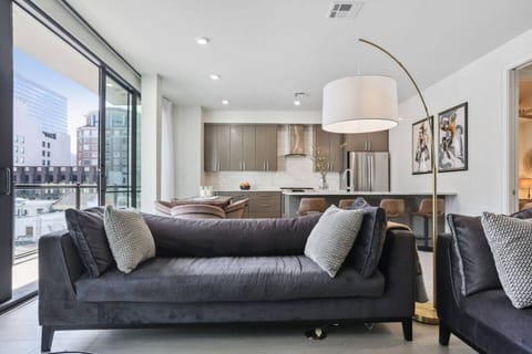 Spacious Living Room + Balcony Access