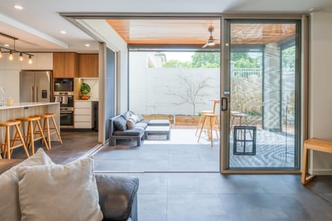 Our airy living room with the view of the patio.