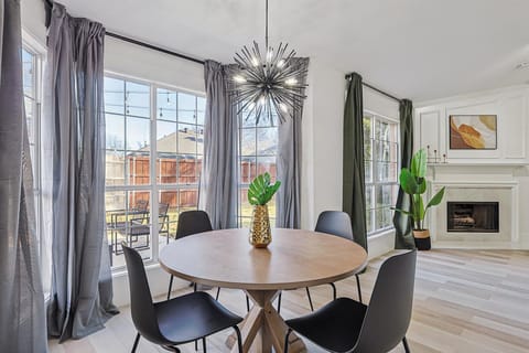 Warm and inviting with plenty of natural sunlight, this breakfast nook is the perfect place for enjoying the first sips of your morning coffee. 