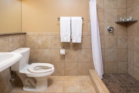 Rinse off easily in the tiled shower with fresh towels ready