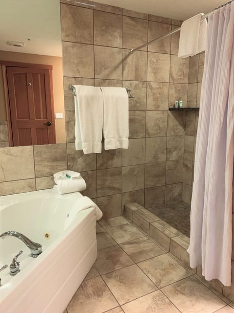 Refresh with a deep soak and a spacious walk-in shower