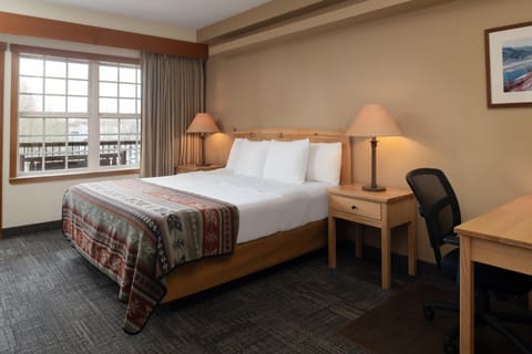 Sink into crisp linens and wake up to window light.