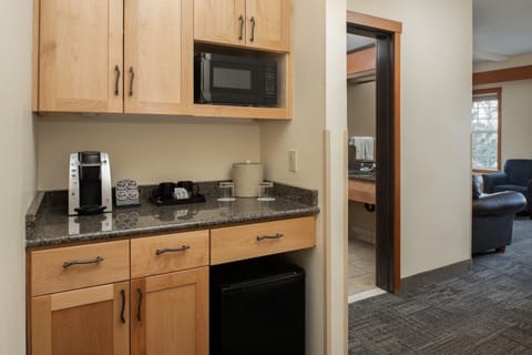 Start mornings with easy coffee and convenient in-room snacks.