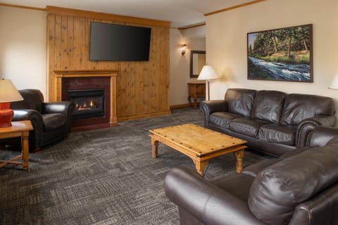 Gather by the glowing fireplace for cozy movie nights.