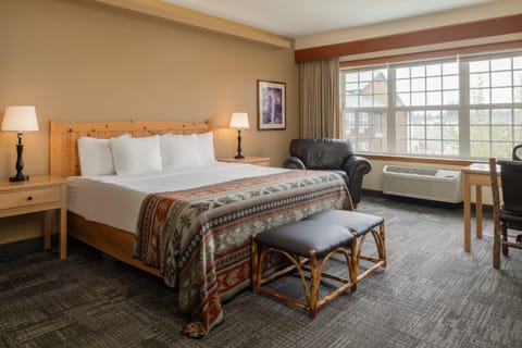 Wake up refreshed beside big windows and relaxing seating.