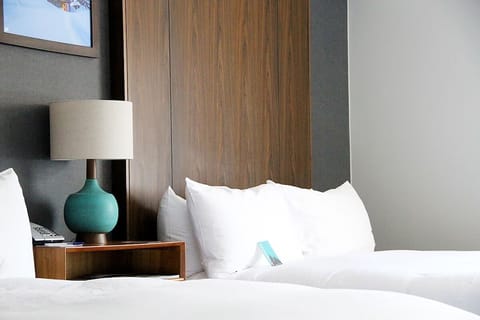 Unit with 2 Queen beds. Exact unit will be assigned upon arrival. Views, colors, and decor may vary.