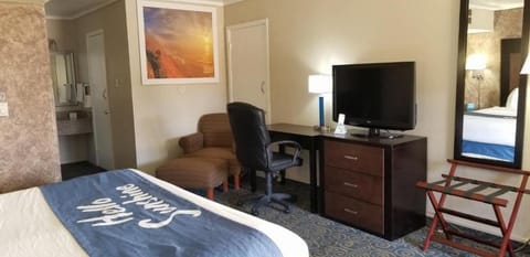 Unit with 1 King bed. Exact unit will be assigned upon arrival. Views, colors, and decor may vary.