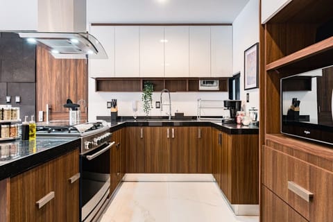 Fully equipped kitchen, ready for everything from morning coffee to gourmet meals.