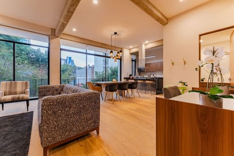 Gorgeous views and natural light make this living and dining area shine.