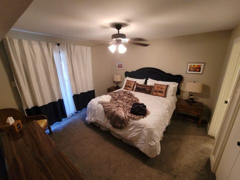 Master Bedroom with King bed and bathroom 