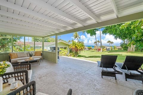 Spend your vacation in a home with a spacious patio and tropical ambiance.