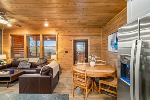 Enjoy delicious meals around the stylish dining table and kitchen island—perfect for family dinners and friendly chats.