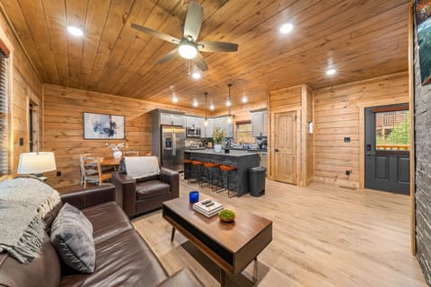 Comfortable seating, cozy fireplace, and stunning mountain views—your perfect spot to gather and relax.