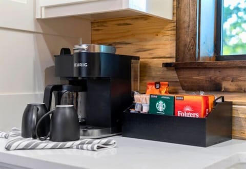 Start your mornings with ease at the coffee bar, complete with everything you need for your favorite brew.