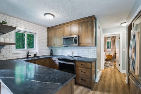 Cook with ease in a sleek, renovated kitchen with all essentials.