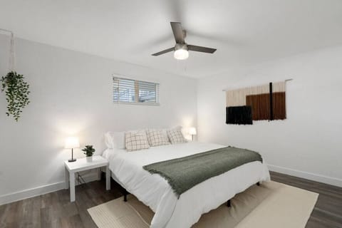 The king bedroom offers a luxurious retreat, with a bed that promises restful nights and a room that feels like a private oasis.