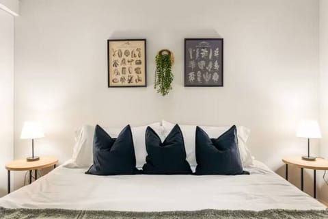 The king bedroom offers a luxurious retreat, with a bed that promises restful nights and a room that feels like a private oasis.