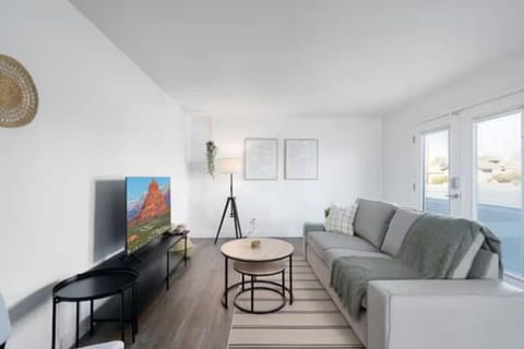 As you take a seat in the living room, the comfortable furniture and tasteful design make it easy to unwind.