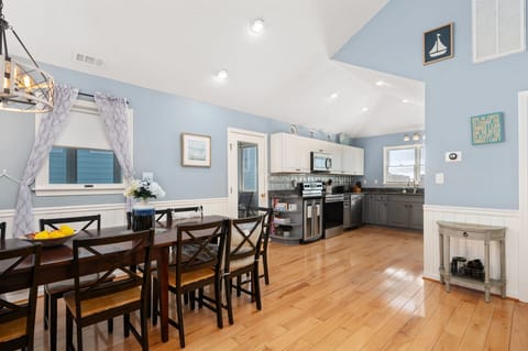 CW03: Starfish Serenade | TL Dining Area and Kitchen - Access to Screened Porch