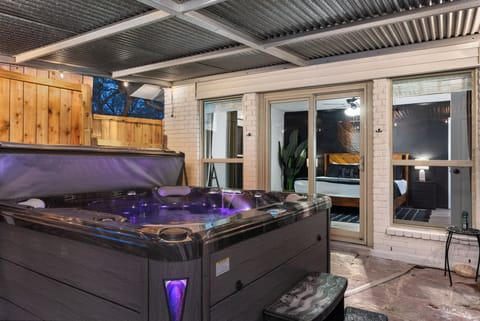 Enjoy our jetted 8 person hot tub equipped with Bluetooth speakers