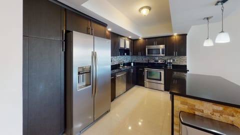 Full Kitchen with stainless steel appliances 