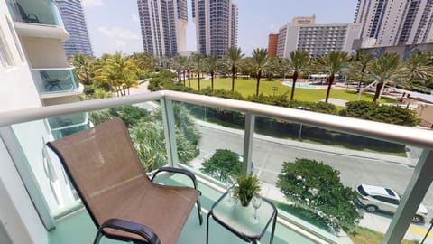 Balcony with Park view! Just steps to the beach! 