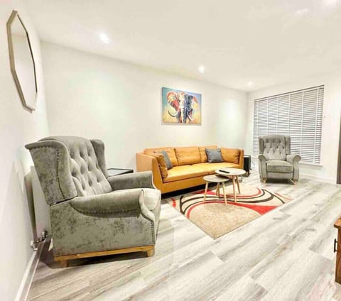 Living area with plenty seating and large 43' Smart TV