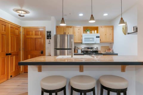 The open counter is a great place for meals and socializing. 
